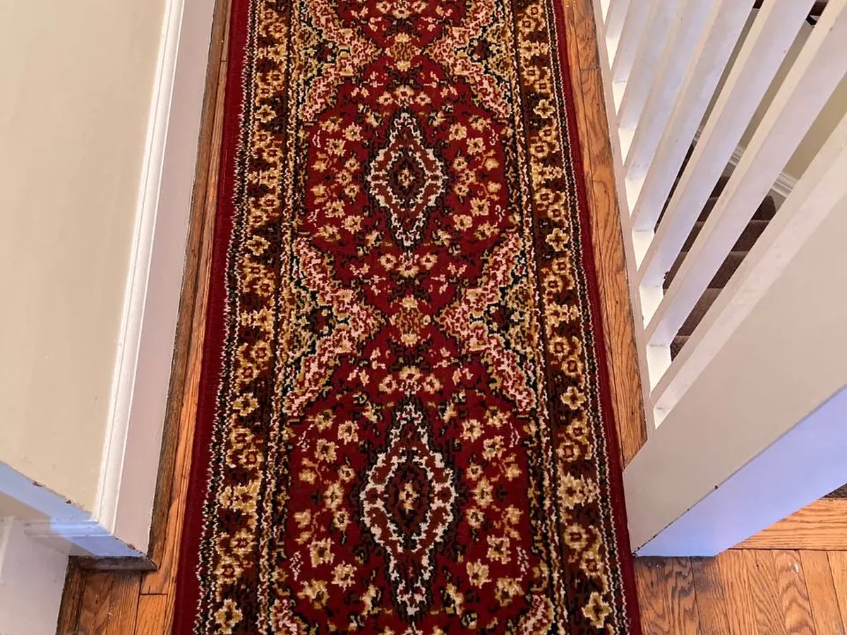 A patterned runner rug after cleaning