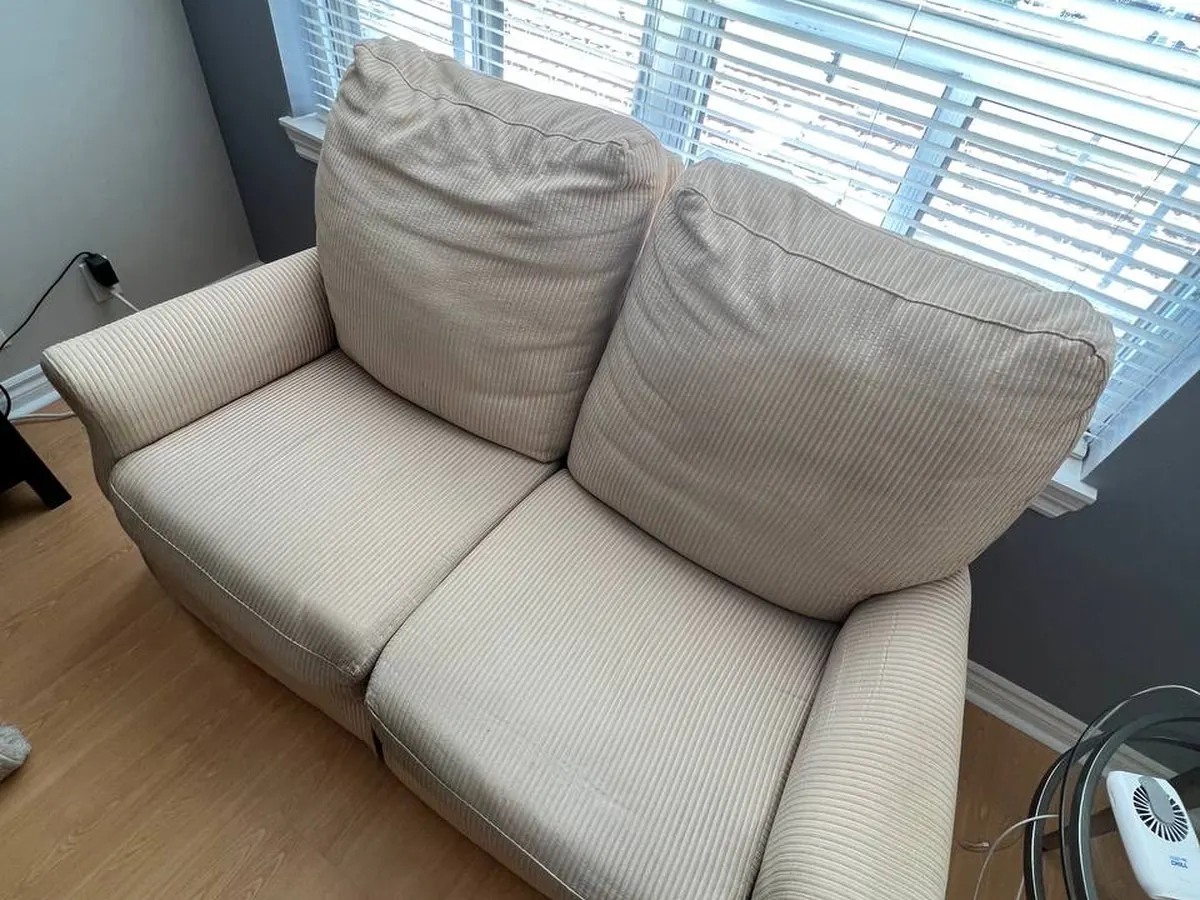 A cream fabric sofa after upholstery cleaning
